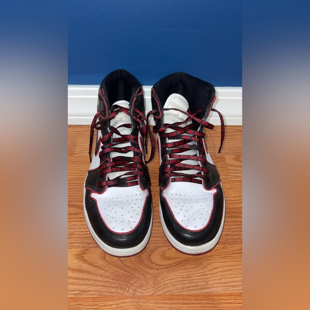 Nike Black and White High-Top Sneakers with Red Accents